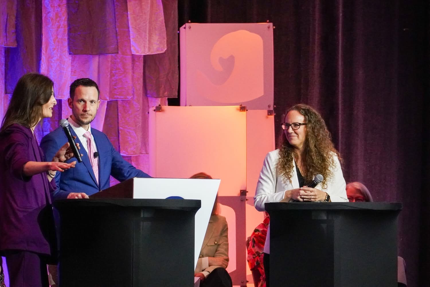 Christopher Weber, MD moderating a conference panel